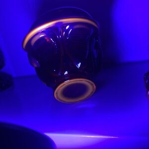 Fenton red small basket , Stamped Fenton ,part glow  orange Under UV light